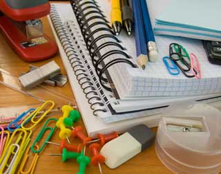 Assortment of office supply items